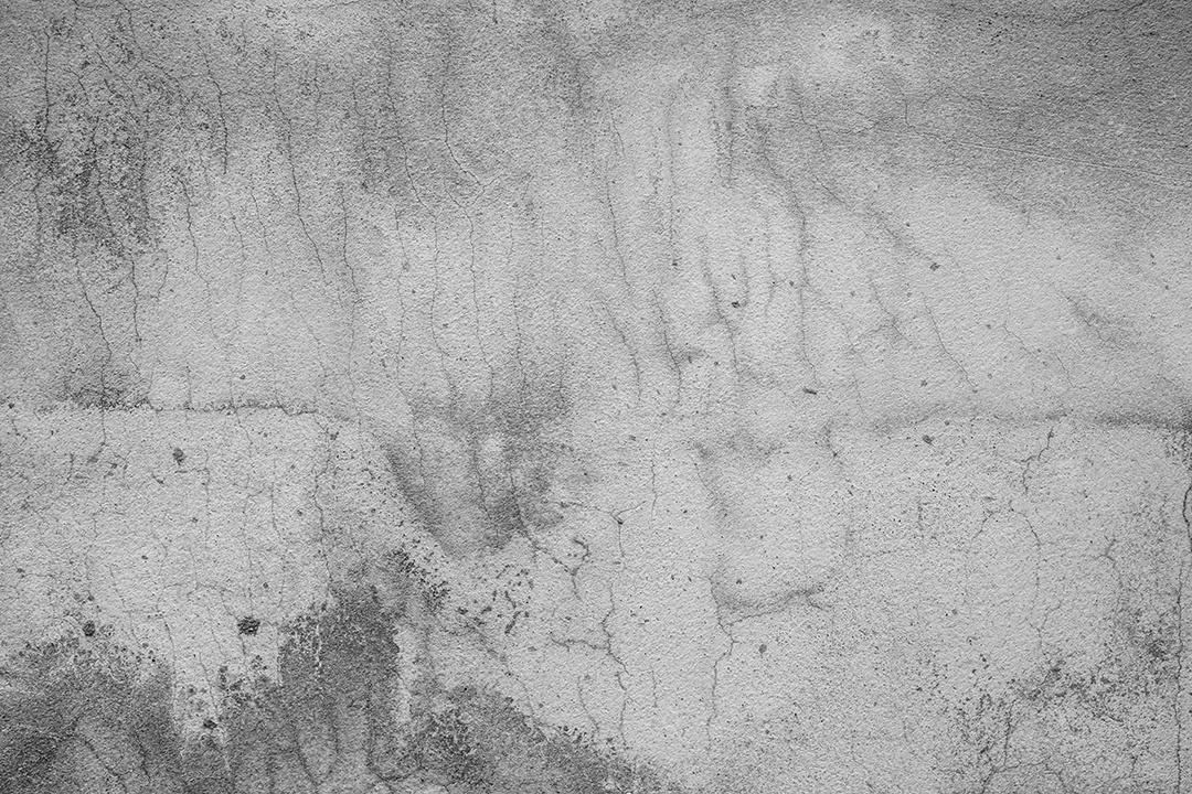 Piso de concreto antigo na cor preto e branco, cimento, quebrado, sujo, textura de fundo