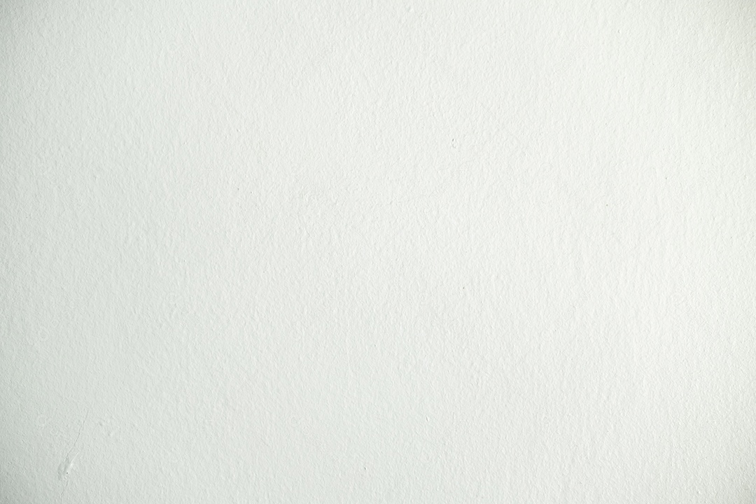 Fundo de textura de parede de estuque de relevo branco áspero. em branco para designer, parede leve, cimento branco