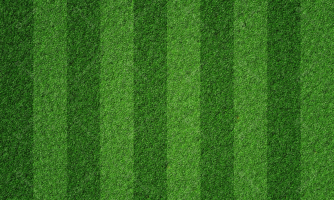 Campo de futebol no estádio de futebol com padrão de grama de linha. Fundo do esporte e conceito de papel de parede atlético.