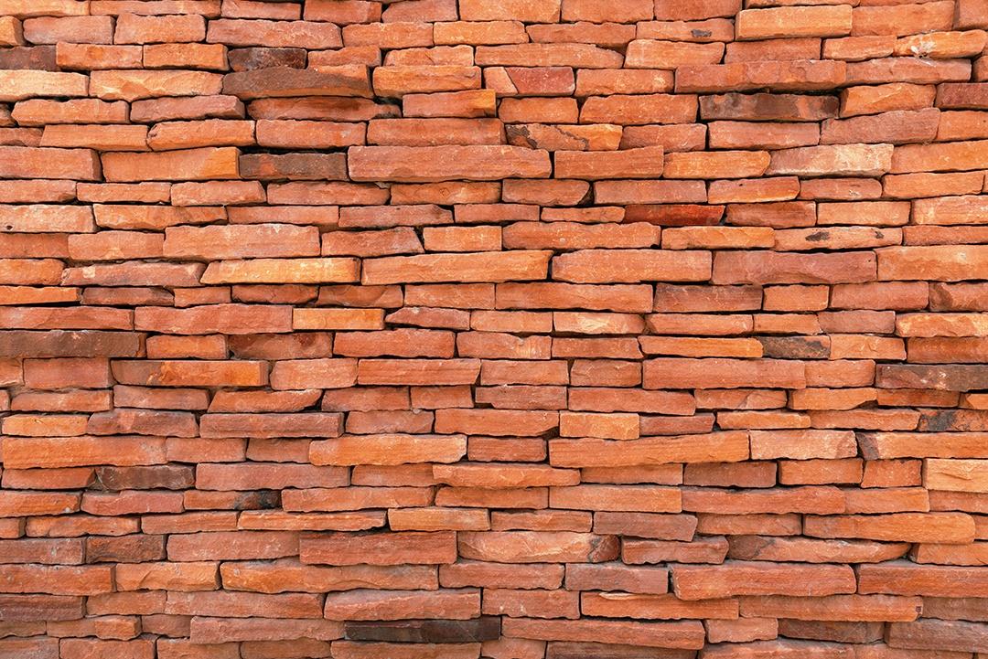 Fundo da parede de tijolo de telhas. Conceito de textura e material. Tema da estrutura.