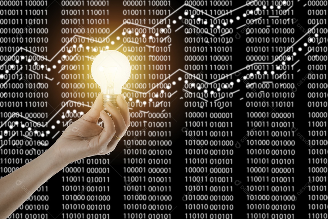 Uma mão humana segura uma lâmpada brilhante