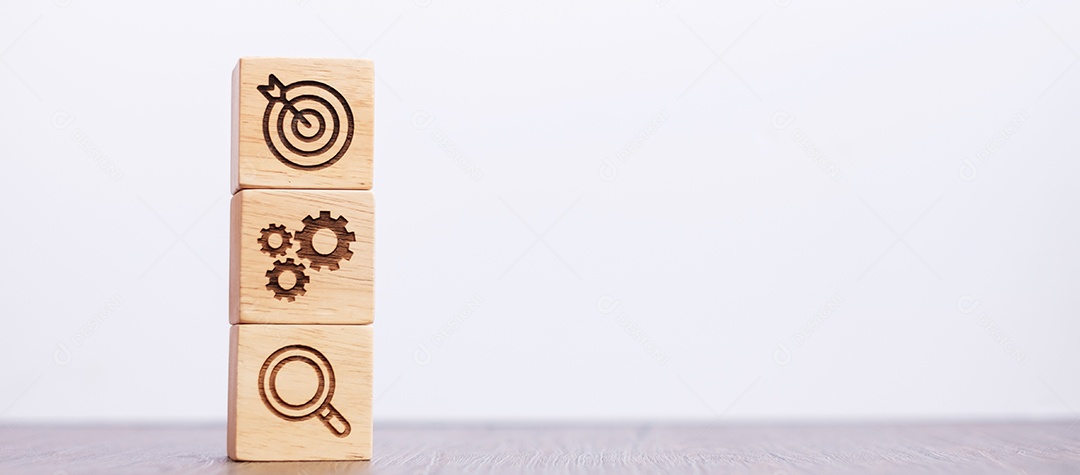 bloco de madeira com objetivo de negócios, estratégia, alvo, missão, ação, objetivo, trabalho em equipe, brainstorm e conceito de ideia