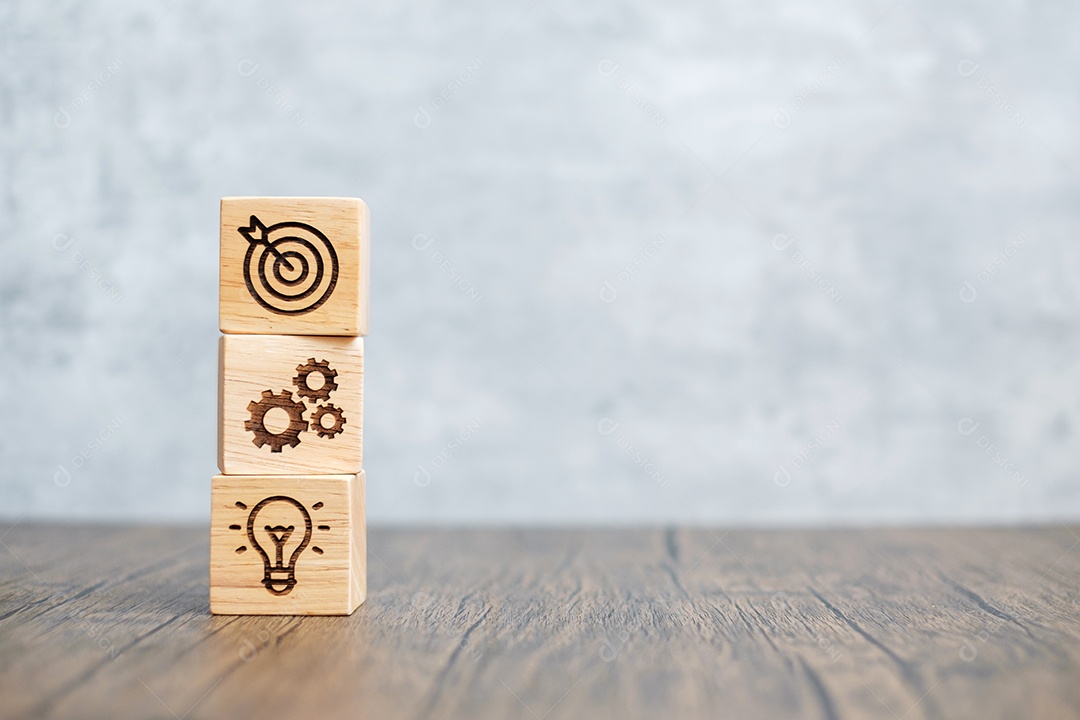 bloco de madeira com objetivo de negócios, estratégia, alvo, missão, ação, objetivo, trabalho em equipe e conceito de ideia