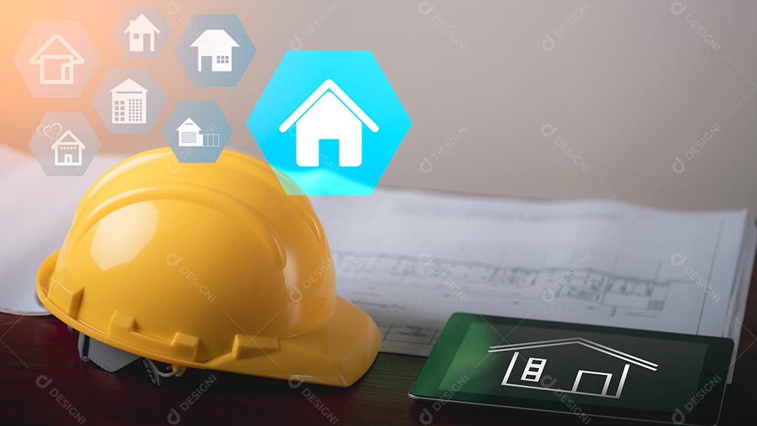 O chapéu do arquiteto repousa sobre a mesa.