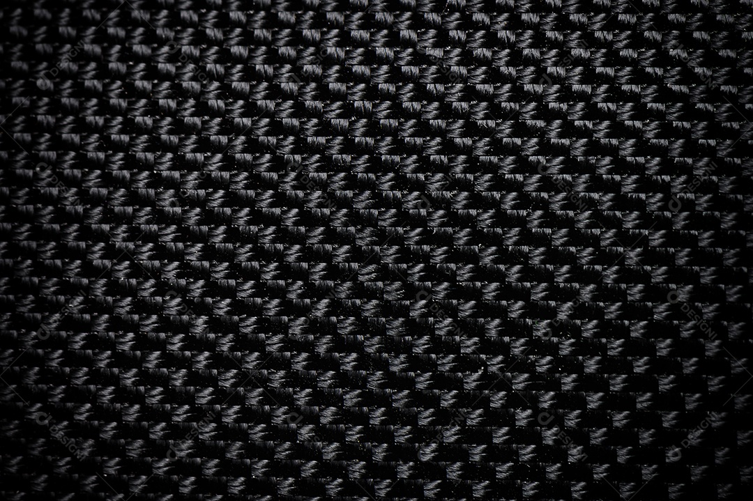 Fundo de textura de seda de lona de tecido preto. Detalhe abstrato do close up do papel de parede material têxtil.