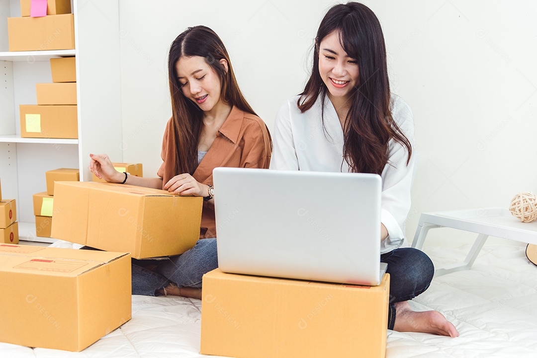 Jovem asiática iniciante empresária de pequenos negócios SME.