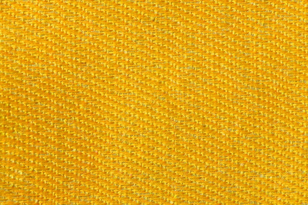 Fundo de textura de tecido de lona de ouro amarelo. Conceito de têxteis e decoração. Papel de parede e design de interiores.