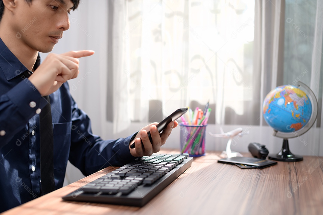 Businessman working in front of a notebook at a table