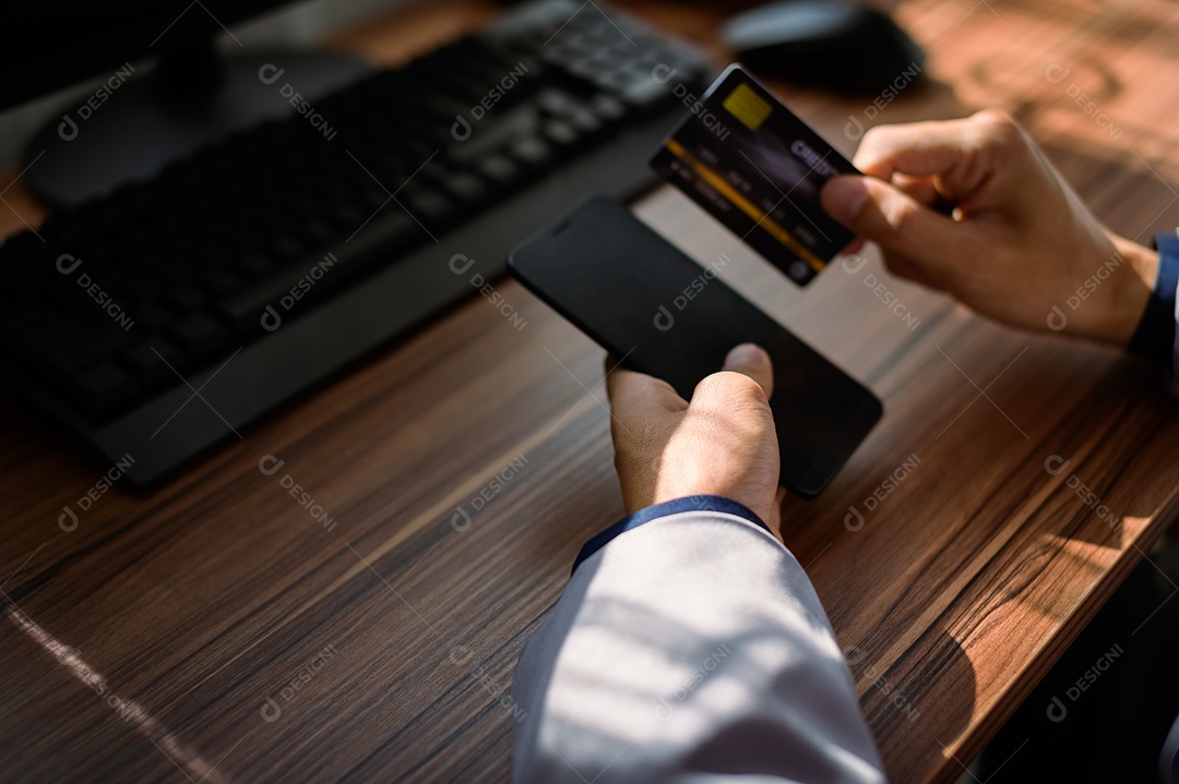 Businessman using smartphone at work