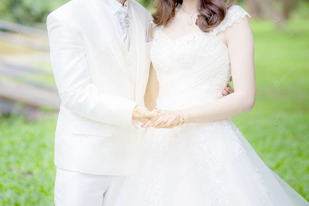 Moda do vestido de noite da noiva e do noivo