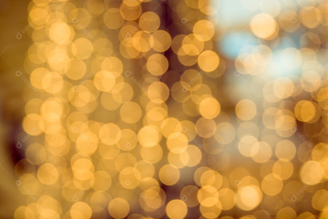 Desfocar a imagem do Bokeh abstrato da árvore cor de fundo laranja