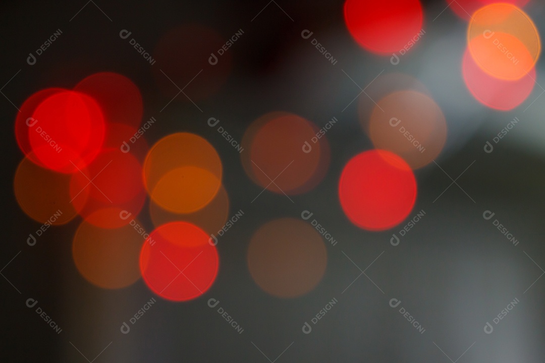 Bokeh vermelho brilhante borrão luzes pontuais em fundo abstrato