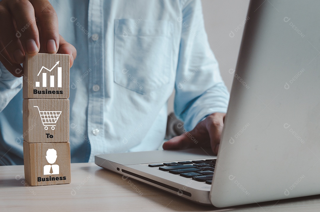 Cubos de madeira com B2B Business e ícones na mesa e cópia espaço. Conceitos de negócios.