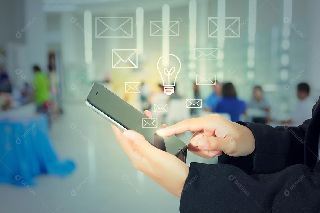 Businessmen and women are using mobile and touch smart phone for communication and checking