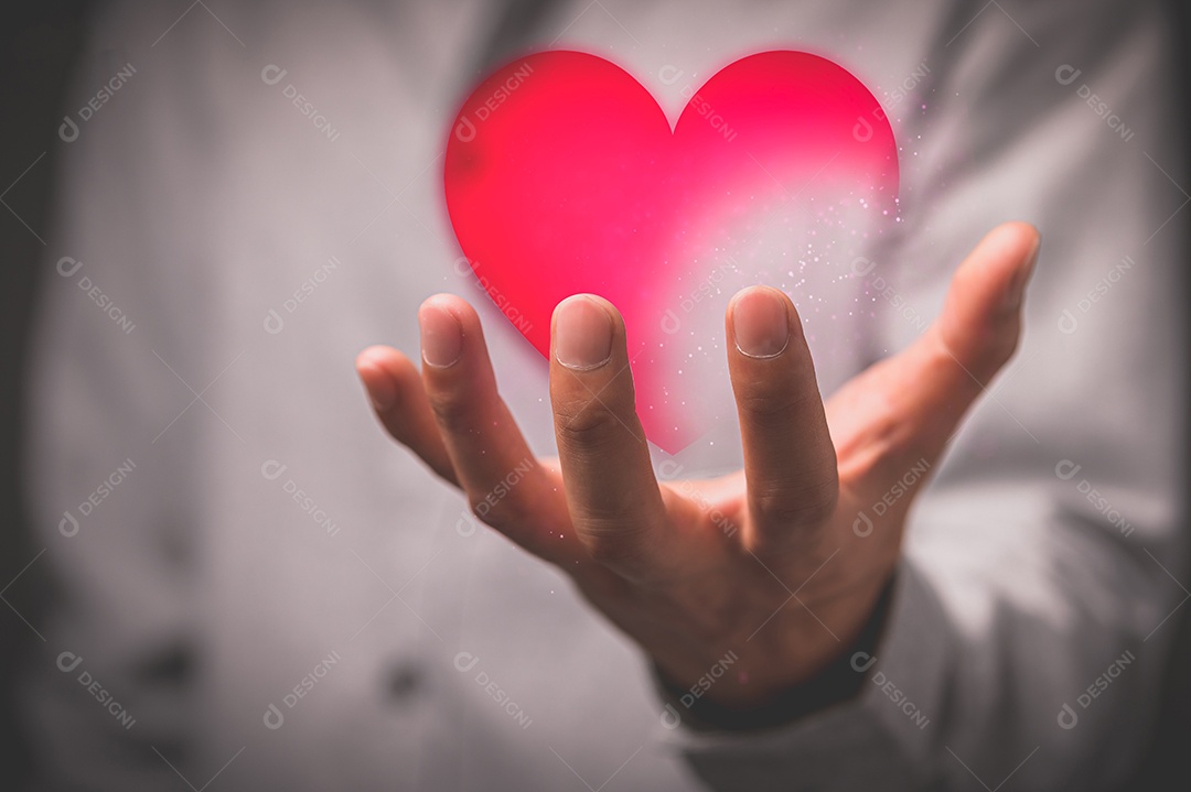 Hand showing heart symbol hologram