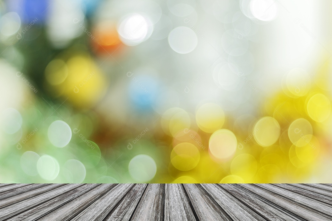 Tampo vazio da mesa de madeira ou balcão em Bokeh circular abstrato