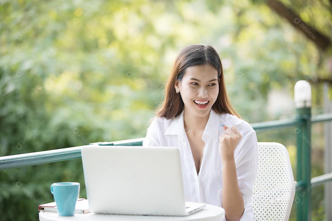 Asian businesswoman arm herself for celebration success work, success concept