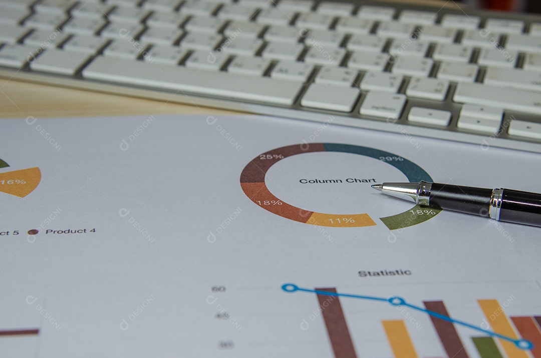 Business document Financial chart and graph and pen with keyboard.