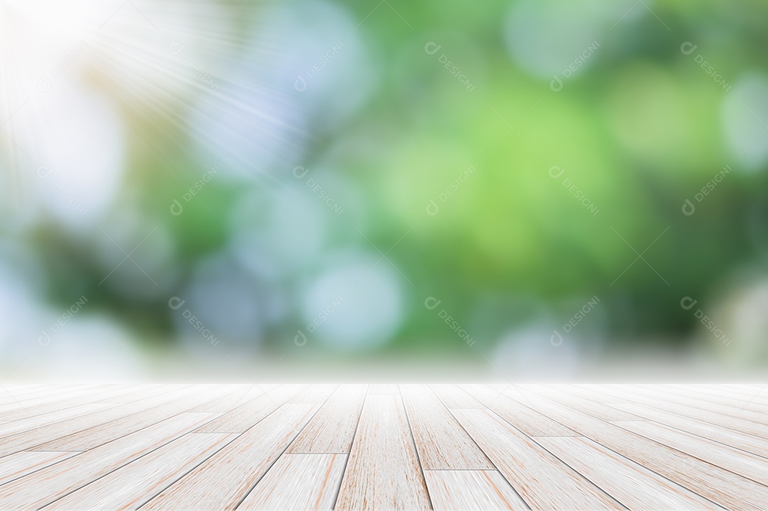 Pano de fundo da cena do piso de madeira Bokeh verde borrão com raio de sol