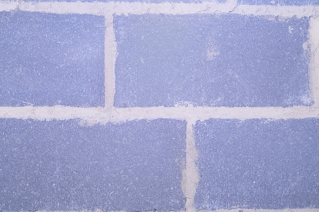 Fundo da parede de tijolos cinza