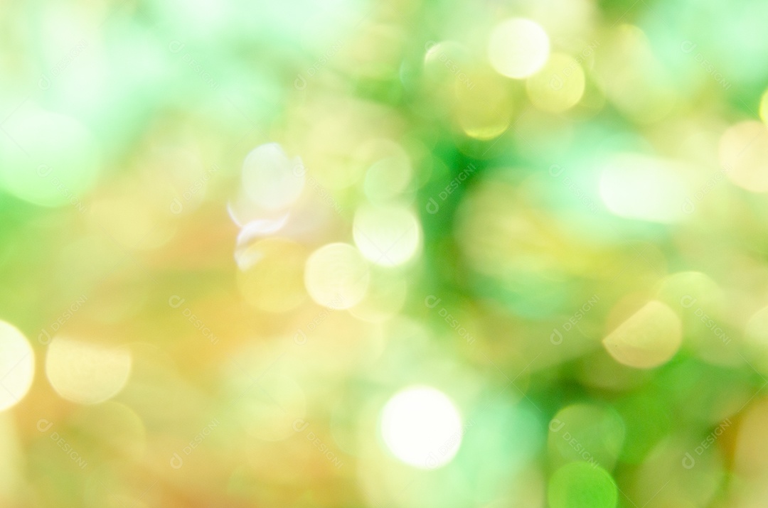 Bokeh amarelo e verde turva abstrato no fundo