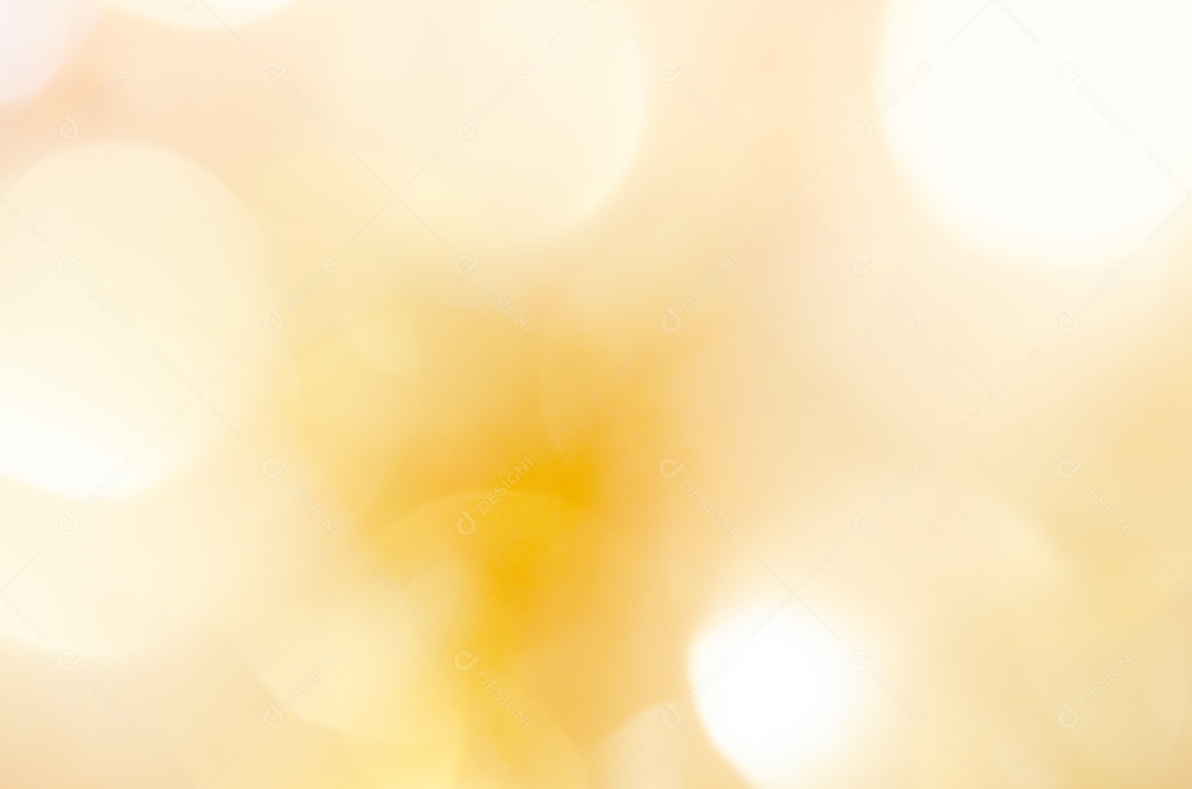 Bokeh amarelo turva abstrato no fundo