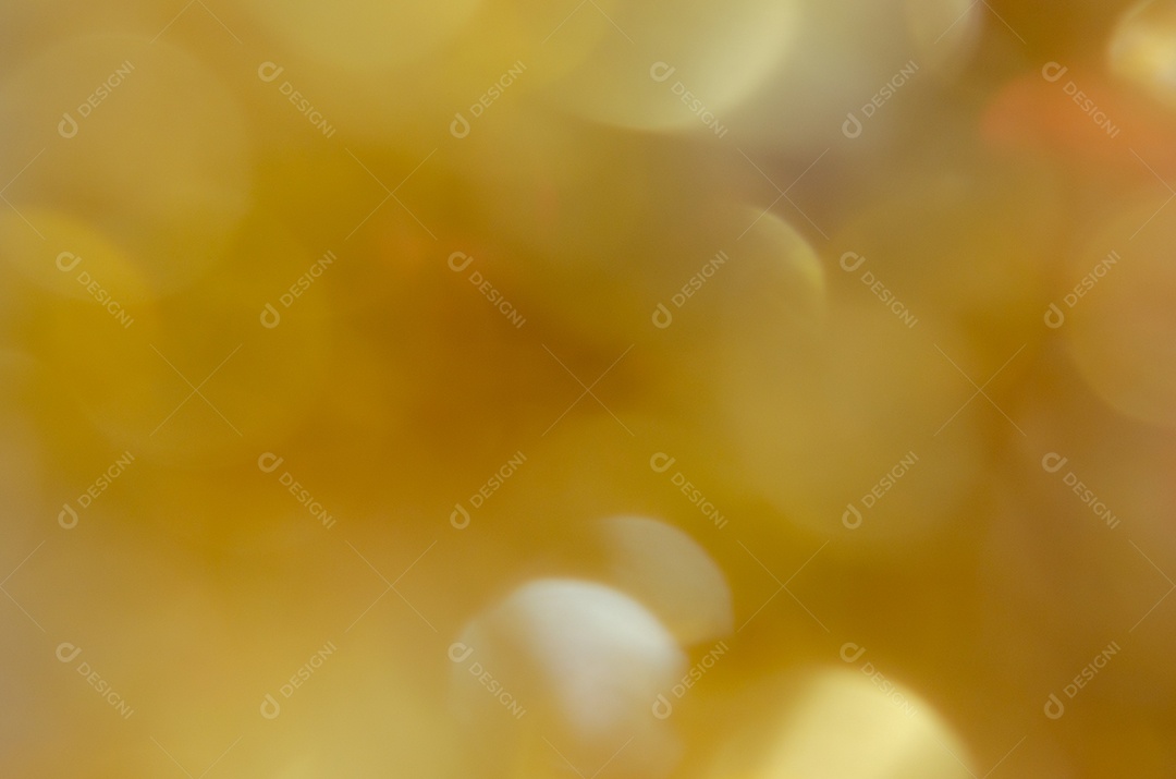 Bokeh amarelo turva abstrato no fundo
