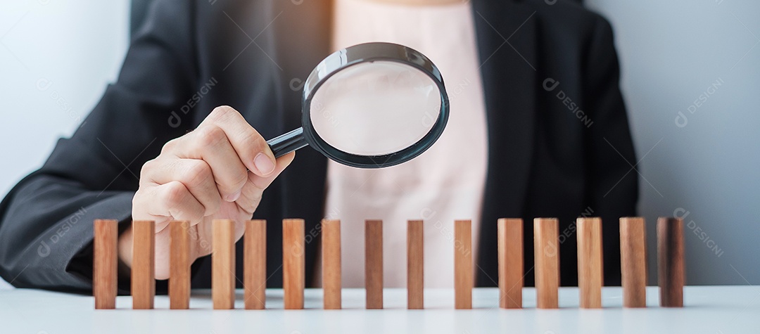 Businesswoman hand pulling wooden leader man from block crowd. Toxic people, human resource management, recruitment, teamwork and leadership concepts