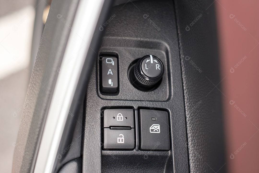 buttons that control the windows inside a car, electric mirror control and adjustment