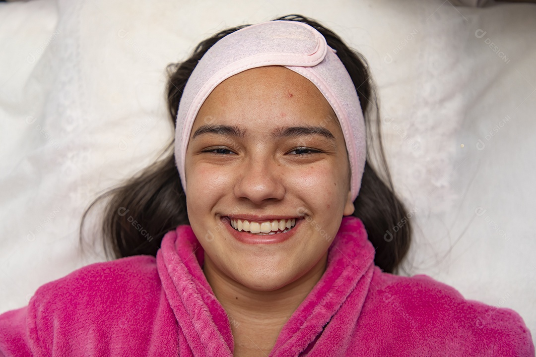 Young woman receiving cosmetic procedures by a professional in the field