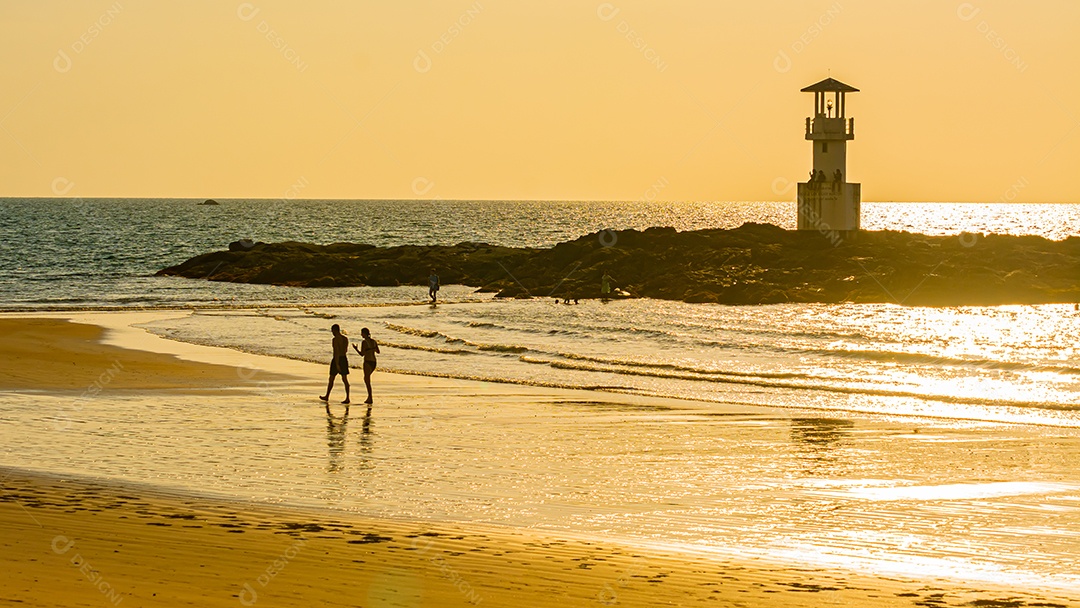 Khao Lak Light Beacon, beautiful sunset at Nang Thong Beach, Khao Lak, Thailand. Tropical colorful sunset with cloudy sky