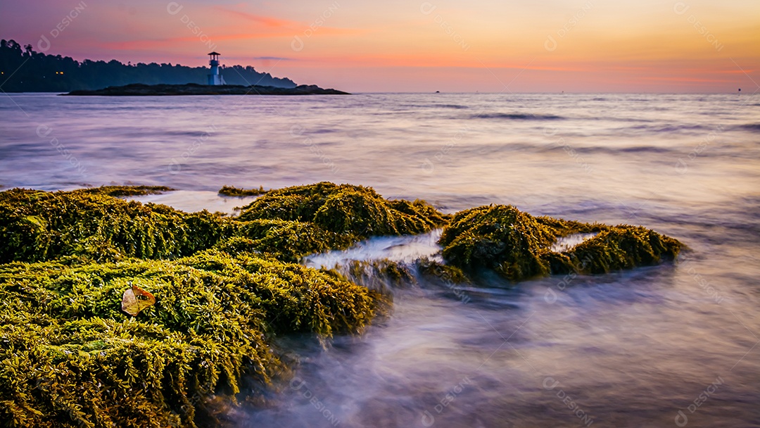 Khao Lak Light Beacon, beautiful sunset at Nang Thong Beach, Khao Lak, Thailand. Tropical colorful sunset with cloudy sky