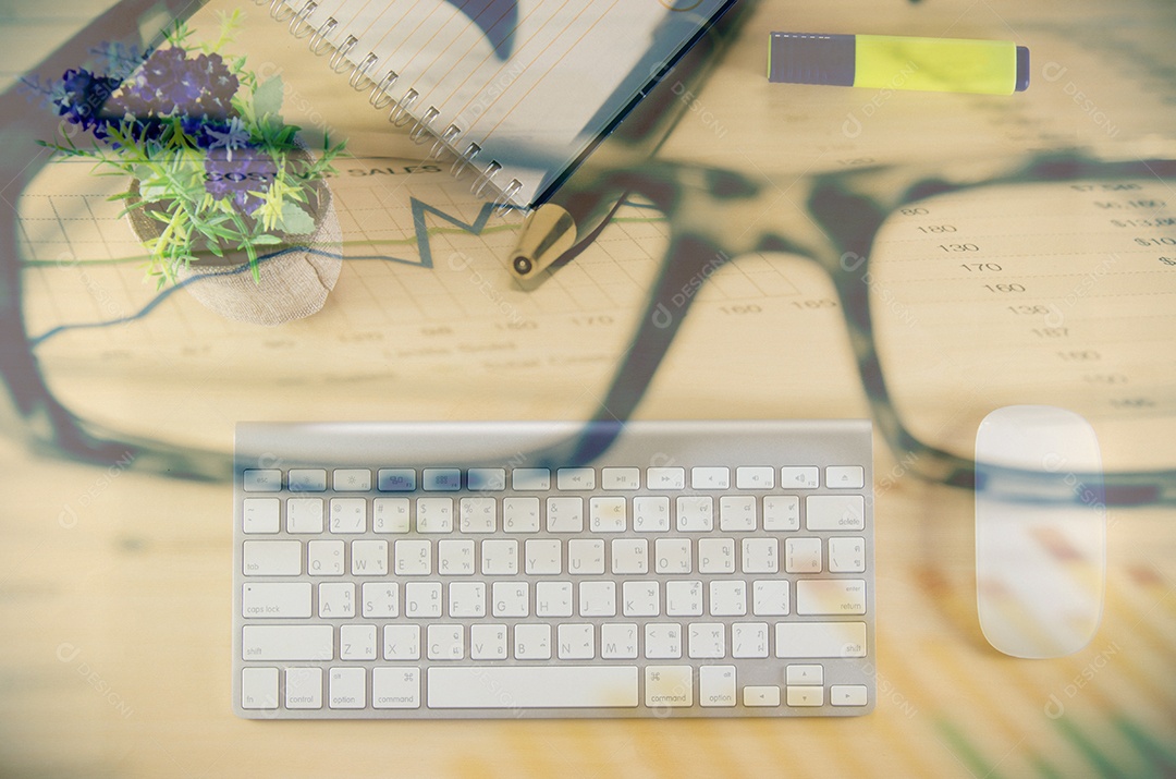 Office desk with notepad, computer. Top view.