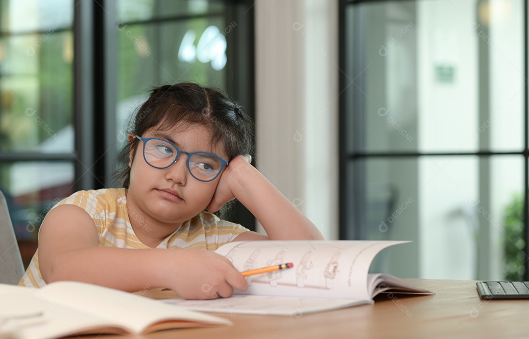 Asian girl are tutoring at home, study online at home, girls are bored and tired of studying.