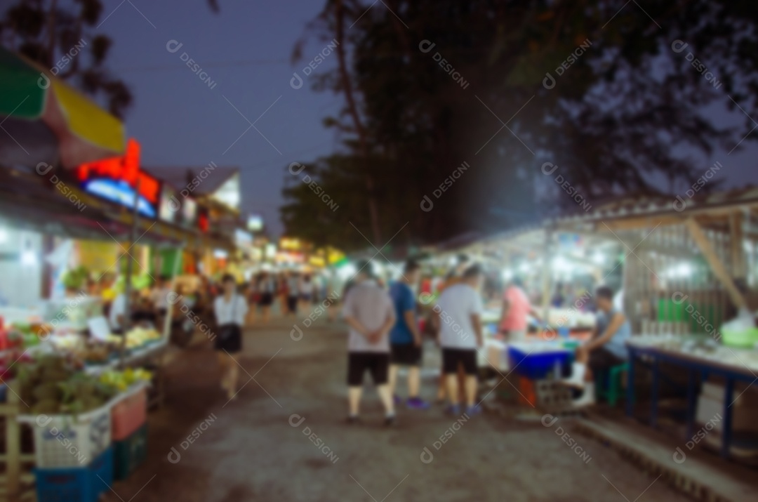 Desfocar o mercado noturno de comida do Festival para uso em segundo plano. pode ser usado para exibição