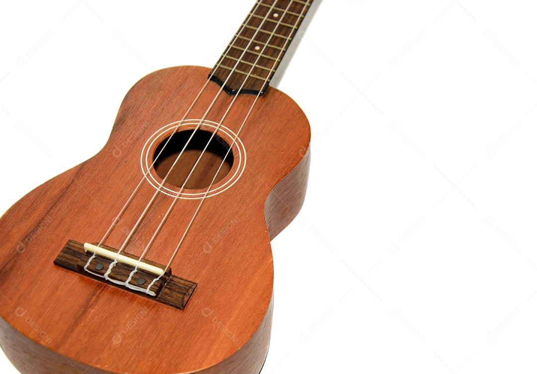 O ukulele é colocado em um piso de madeira vintage.