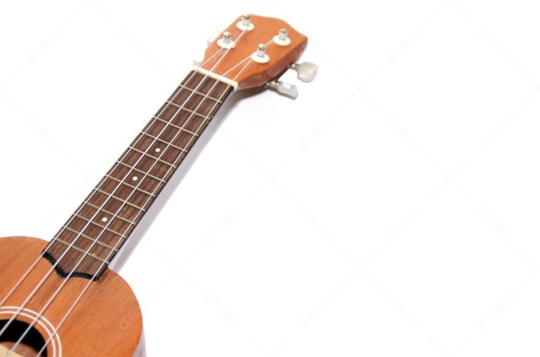 O ukulele é colocado em um piso de madeira vintage.