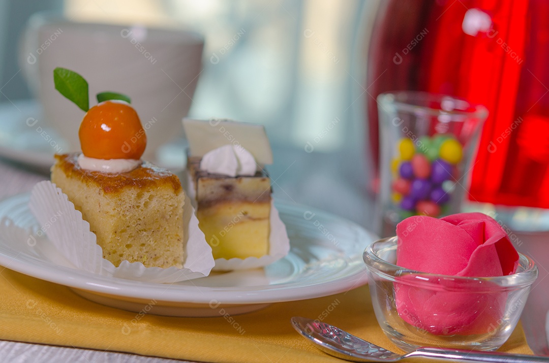 Cake cut into pieces on the table.