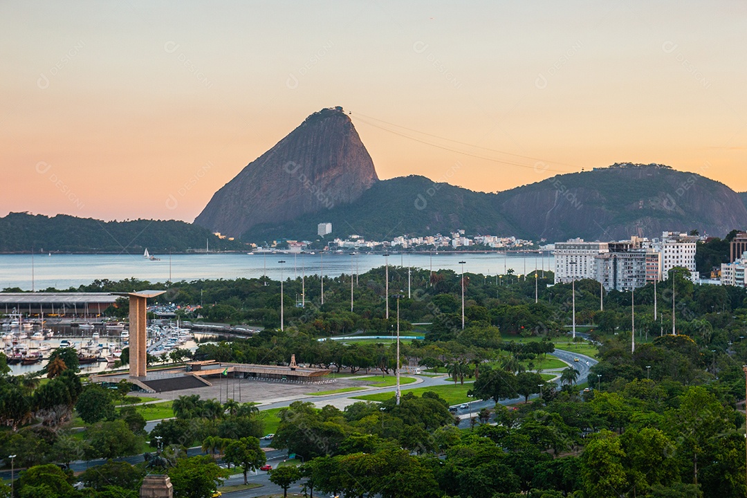 Aterro Flemish at sunset, Sugarloaf Mountain and Guanabara Bay in Rio de Janeiro in Brazil.