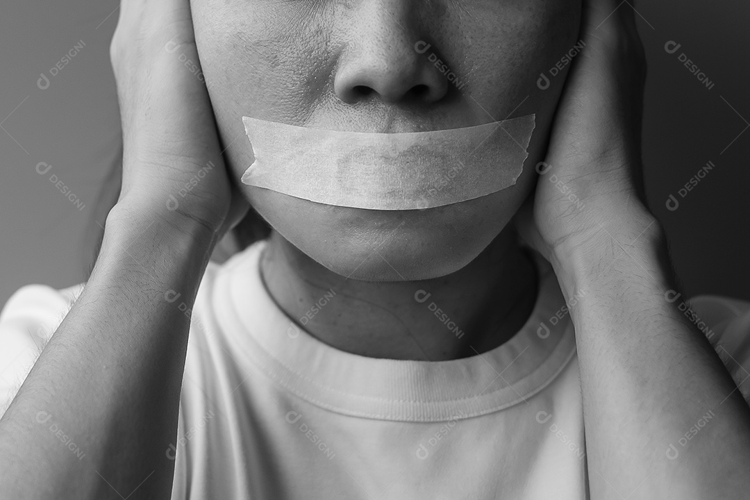 Woman with her mouth sealed in duct tape. Freedom of speech, freedom of the press, human rights, protest dictatorship, democracy, freedom, equality and fraternity concepts