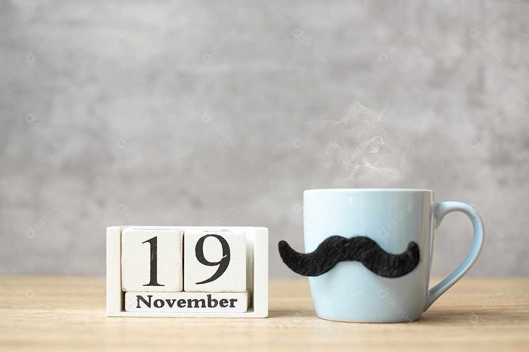 Dia internacional dos homens com calendário de 19 de novembro, xícara de café branca.