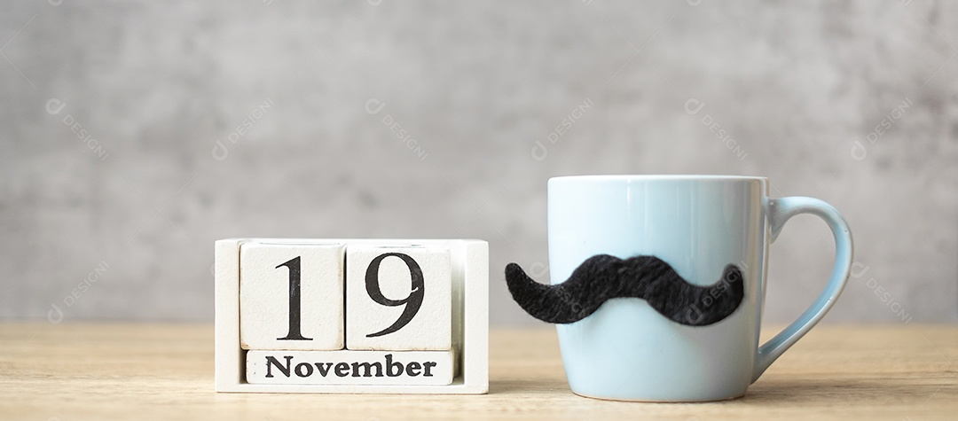 Dia internacional dos homens com calendário de 19 de novembro, xícara de café branca.