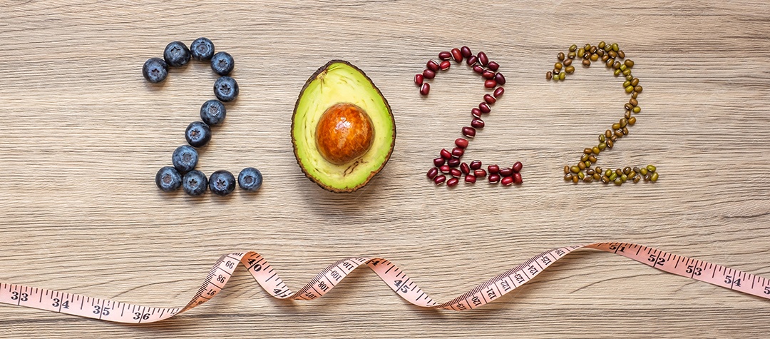 2022 Feliz Ano Novo com frutas e legumes; Mirtilos, Abacate.