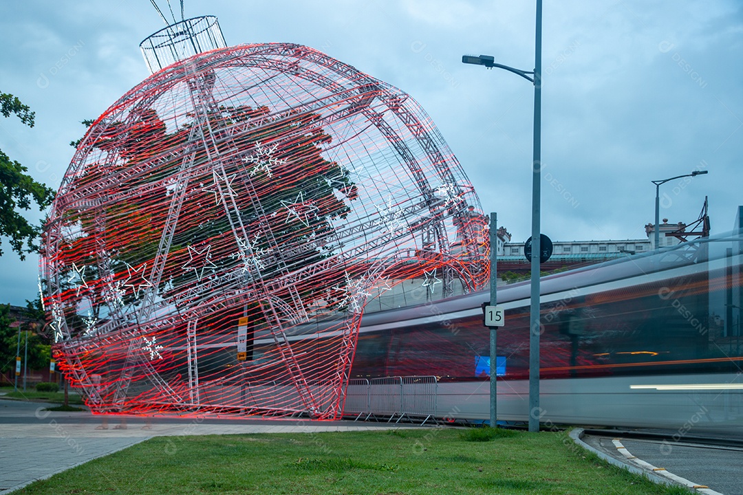 VLT train passing through the Christmas decorations of the port area of Rio de Janeiro in Brazil.