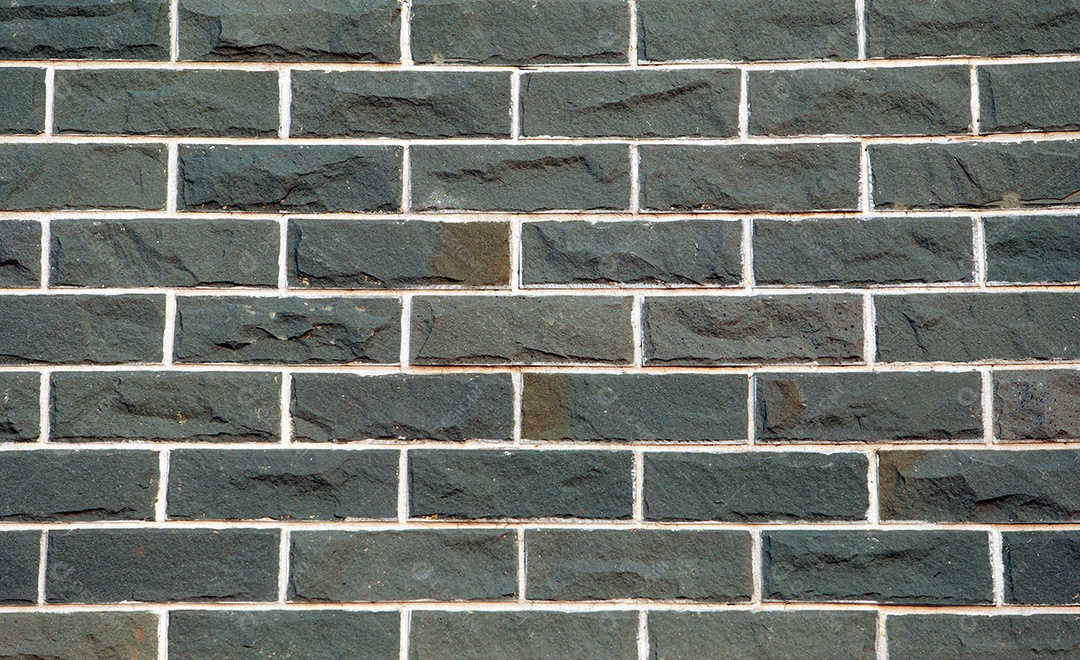 Fundo da velha parede de tijolos antigos