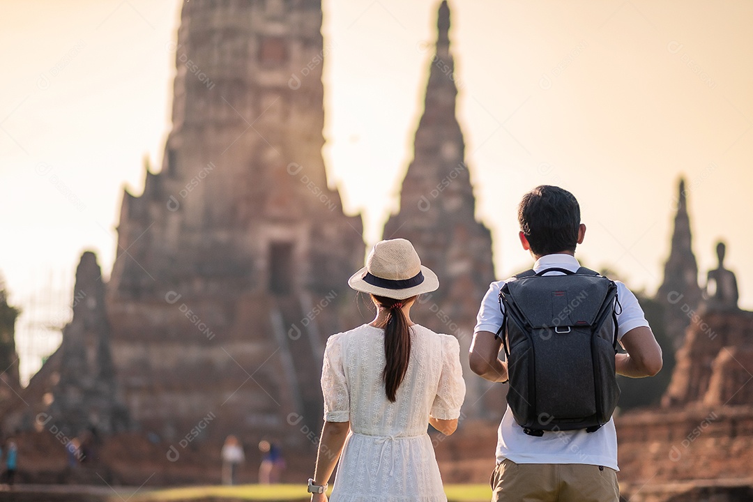 Couple sightseeing tour of ancient stupa at Wat Chaiwatthanaram