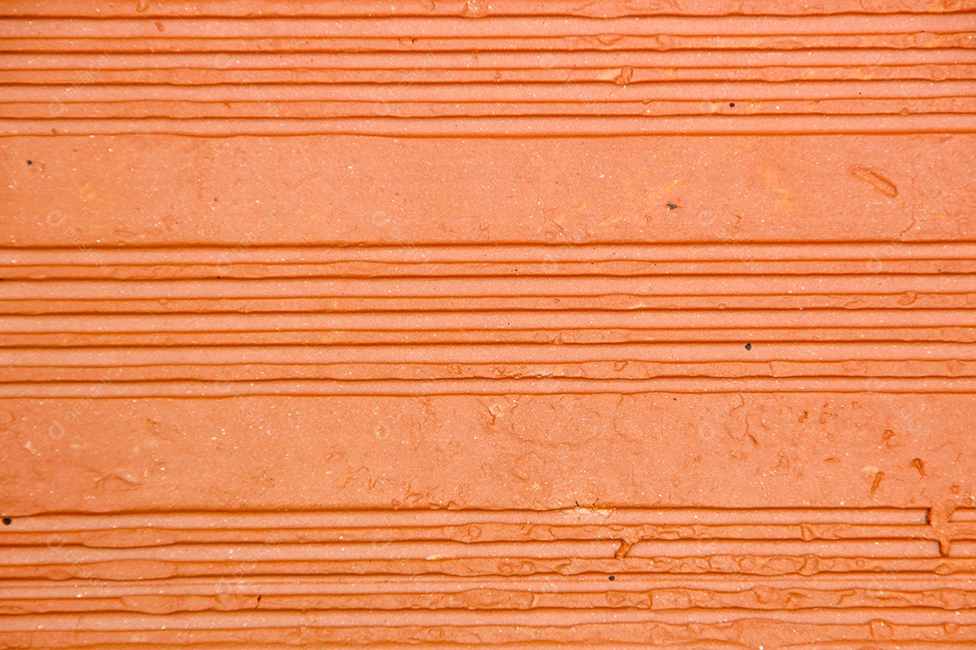 Textura de tijolo vermelho, muito utilizada em obras no Brasil.