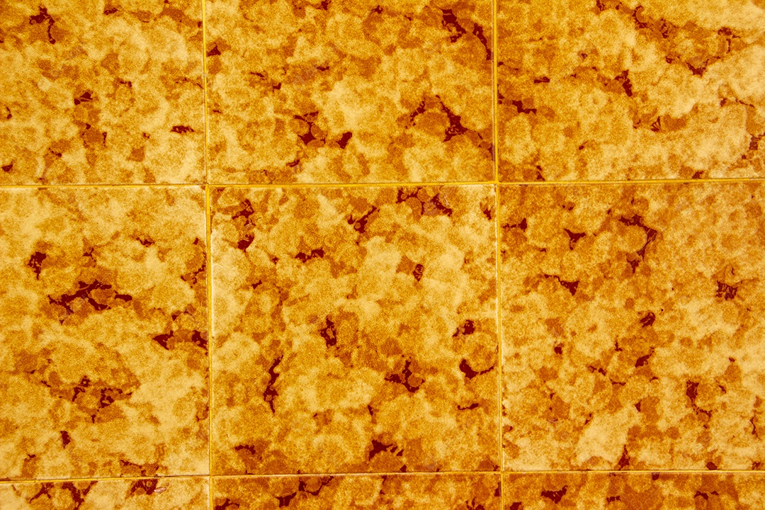textura de telha amarela para plano de fundo em uma parede no Rio de Janeiro.