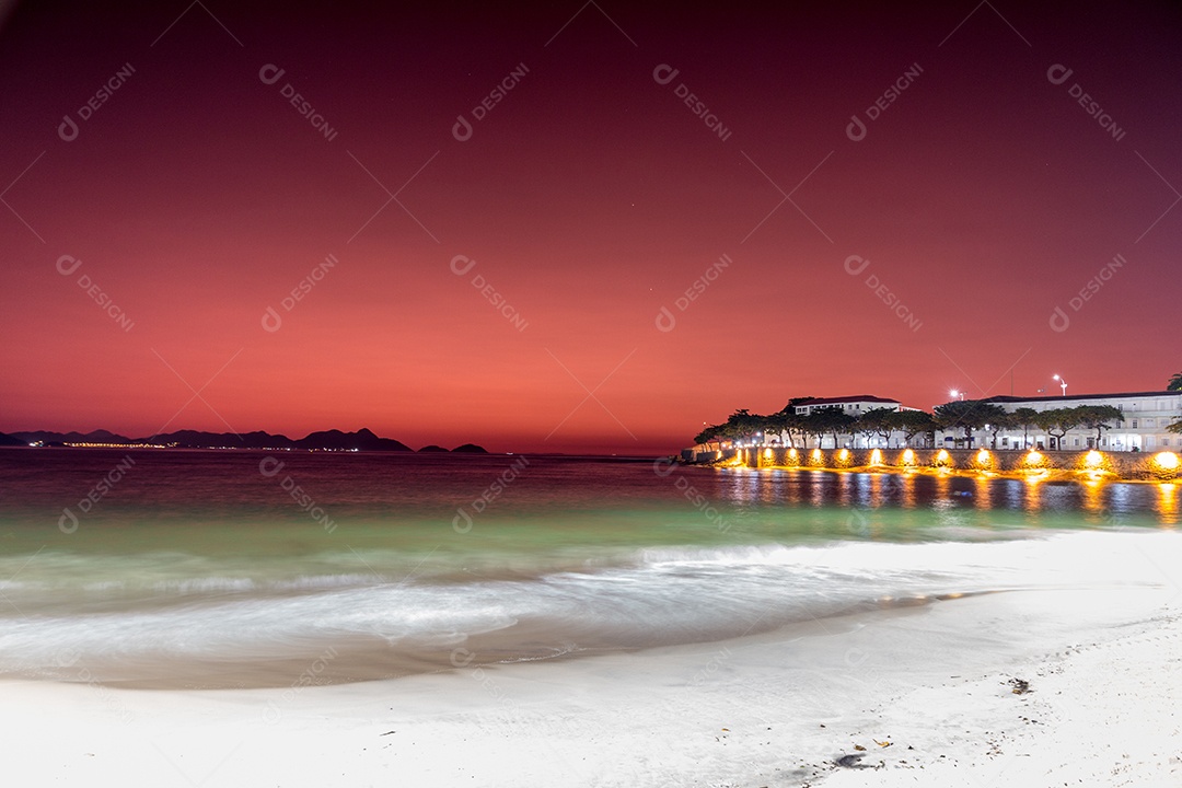 sunrise at Copacabana beach in Rio de Janeiro, Brazil.