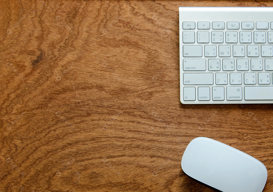 Wooden mouse and keyboard on the table.
